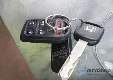 2010 Honda Odyssey Ex-L из США, поврежденный, VIN 5FNRL3H64AB076204